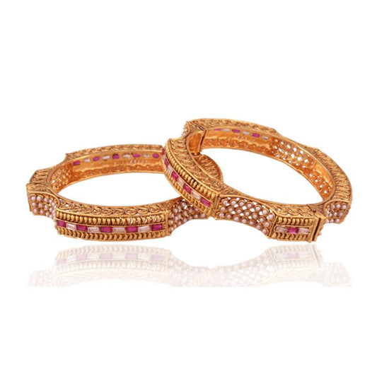 Scintillating gold plated antique bangle